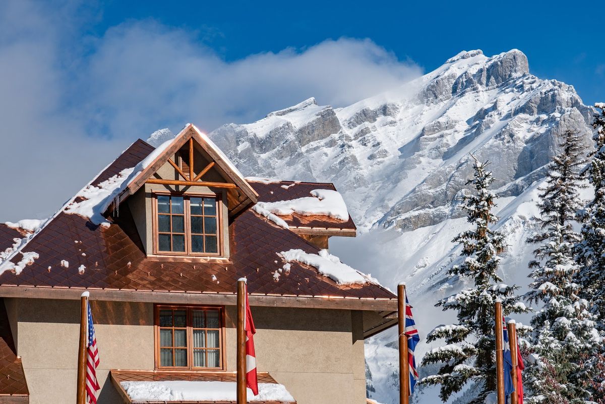 Banff, Alberta — the Canadian Rockies above Bow Valley, the Fairmont Banff Springs castle hotel beneath snow-capped peaks