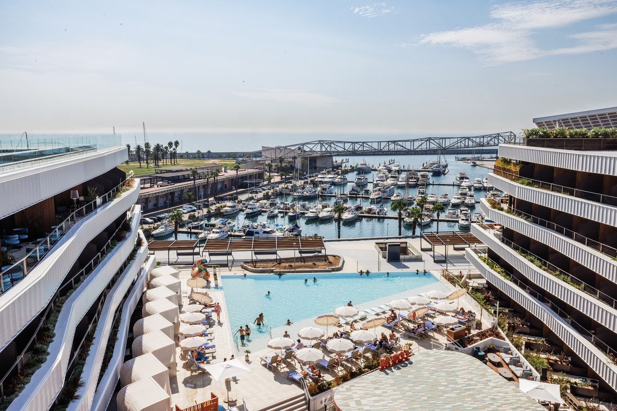 SLS Barcelona — the wave-fronted Rockwell Group tower at Avinguda de la Marina opened October 2023, SLS first European property
