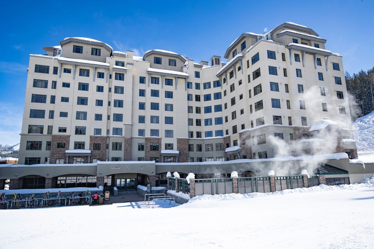 The Lodge at Big Sky — mid-mountain Meadow Village hotel with mountain-view rooms