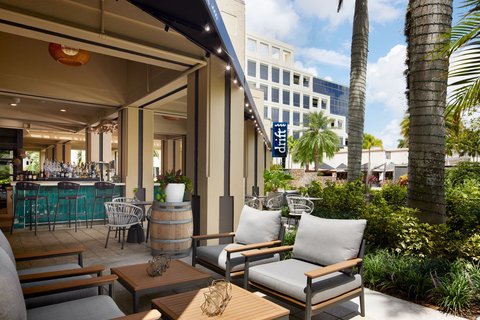 Renaissance Boca Raton Hotel — outdoor pool with tropical landscaping and Meat Market steakhouse