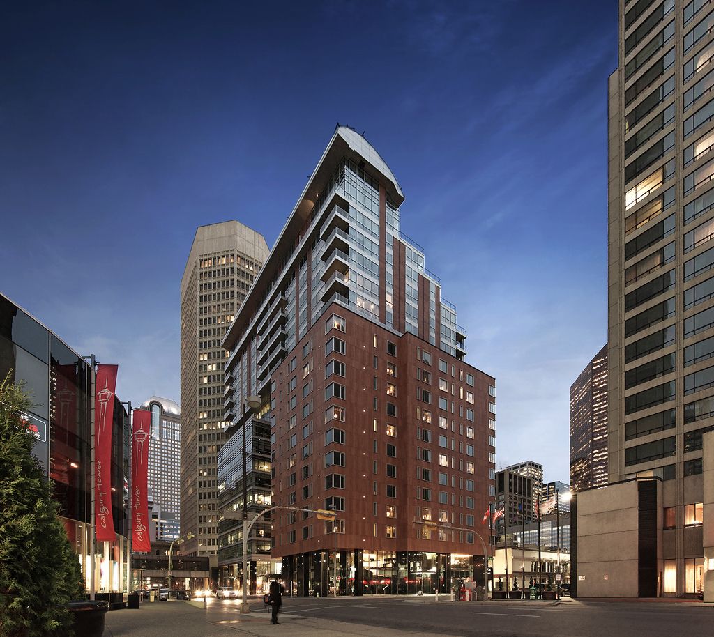 The Dorian Autograph Collection Calgary — boutique hotel rooftop bar Wilde with downtown skyline view