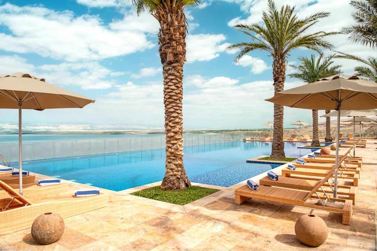 Dead Sea Jordan — lowest point on Earth with mineral salt formations and salty water on Jordanian shore