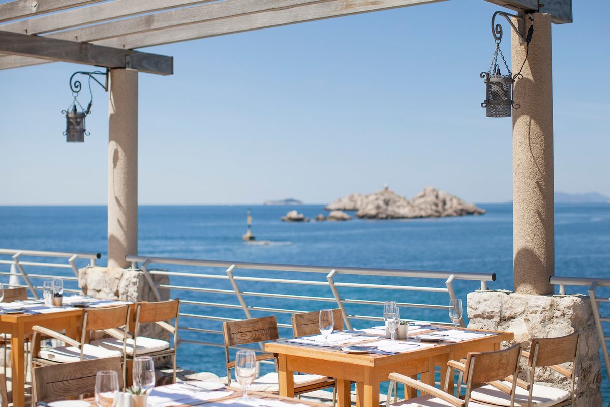 Dubrovnik Croatia — UNESCO Old Town walls and red-tiled roofs above Adriatic Sea, Pearl of the Adriatic