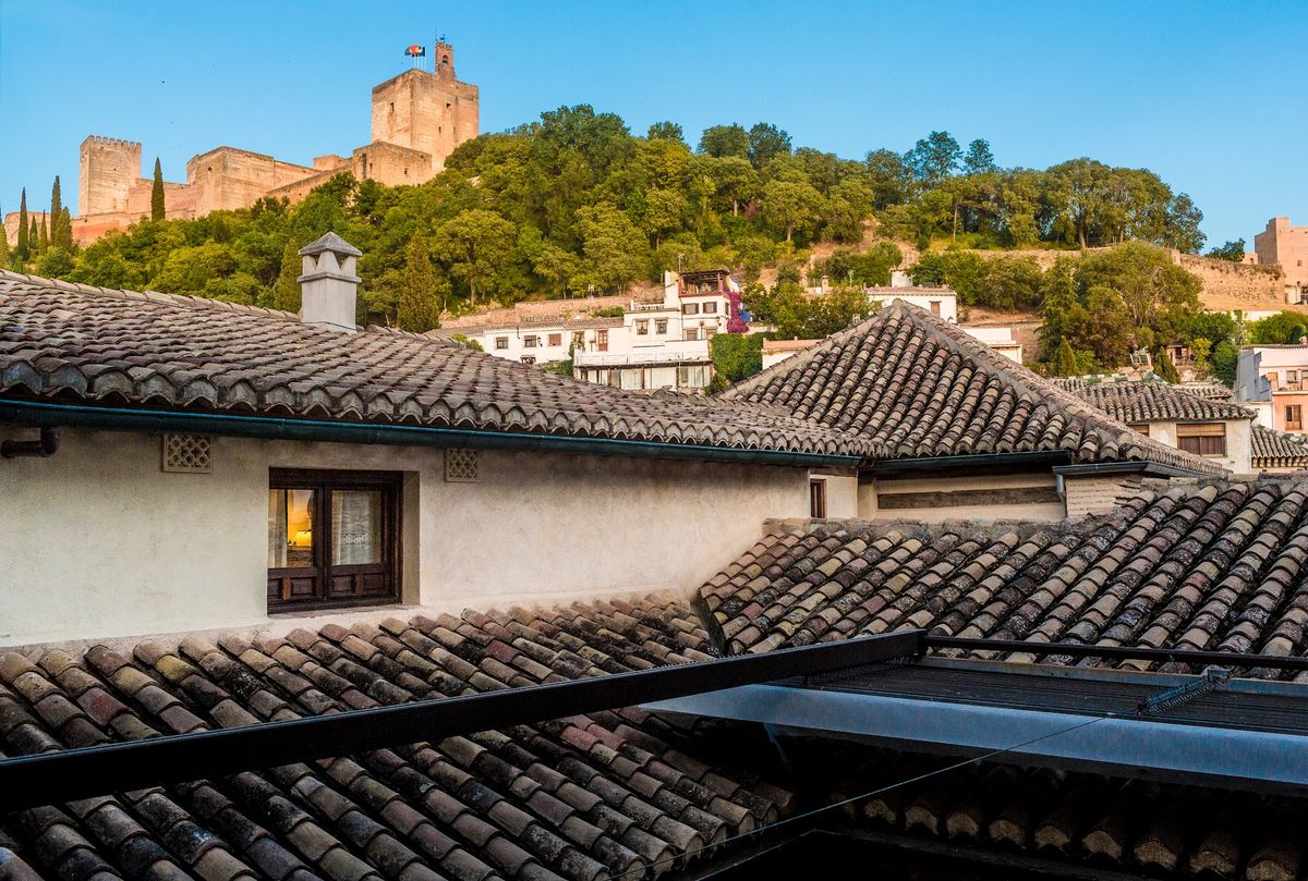 Granada Spain — Alhambra palace and Generalife gardens with Sierra Nevada mountains UNESCO Andalusia