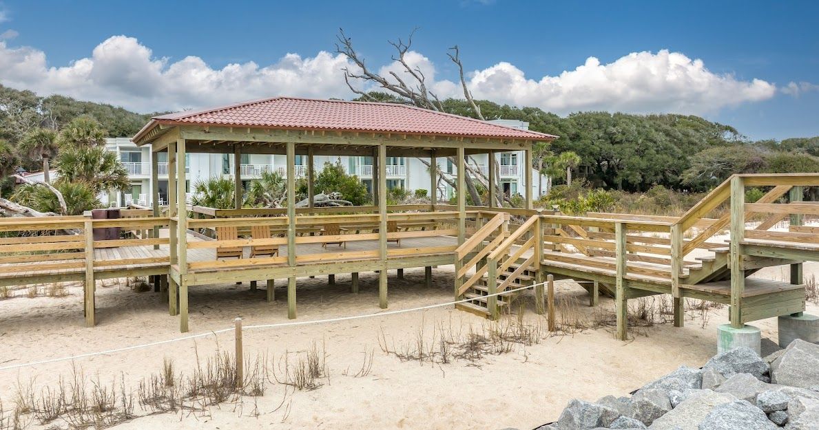 The Cottages Jekyll Island — pastel beach cottages on the South End with private porches and bicycle paths