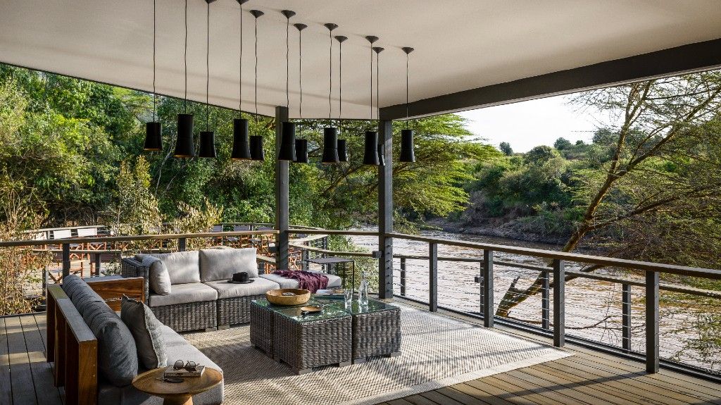 Rekero Camp Maasai Mara — Asilia Africa luxury safari camp with 9 tents on Talek River seasonal migration crossing point