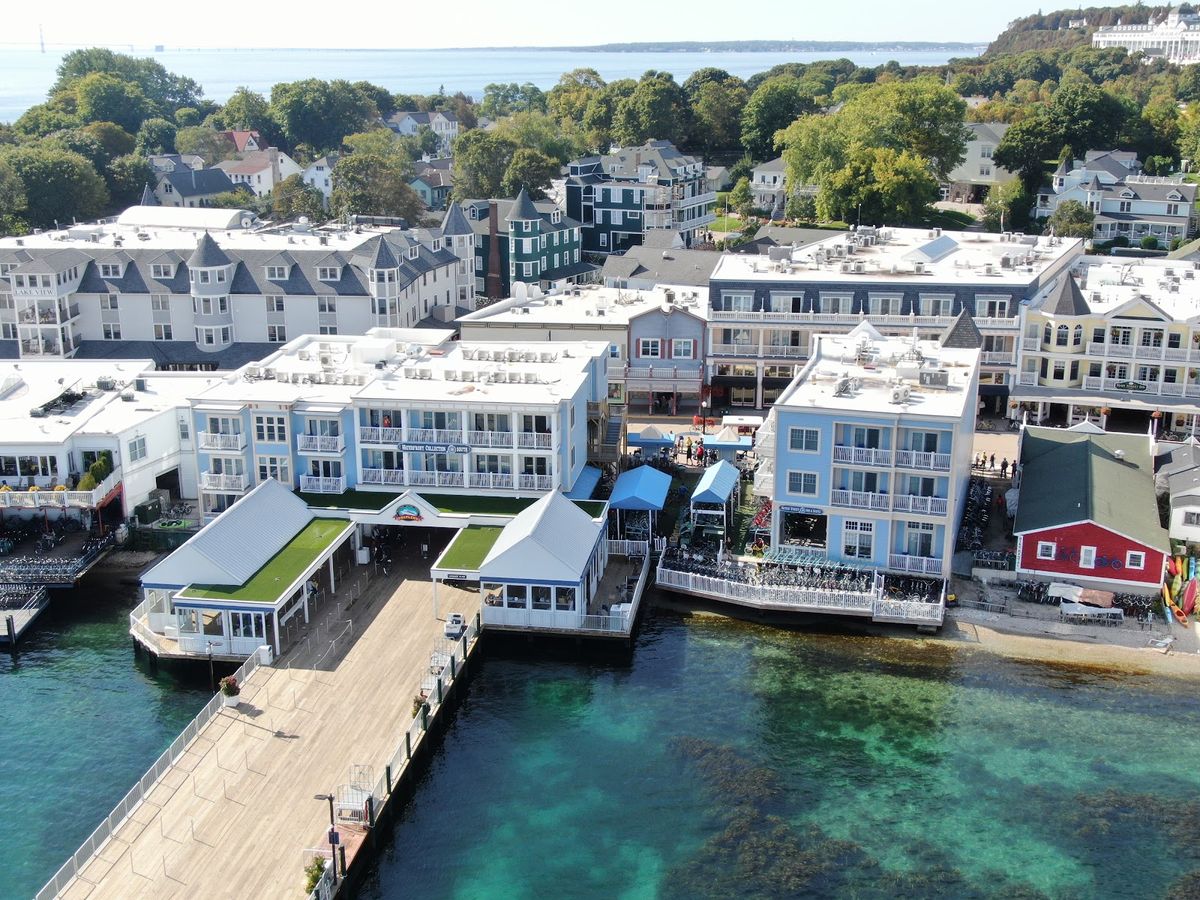Mackinac Island Grand Hotel — Victorian white-columned hotel above Lake Huron, Michigan, with the world's longest porch