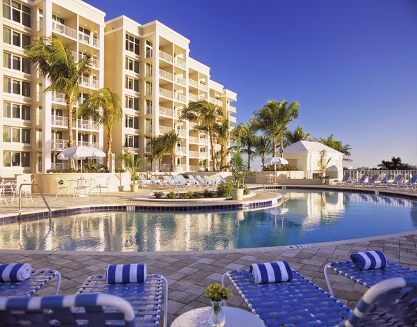 Hilton Marco Island Beach Resort and Spa — South Beach Gulf-front hotel with palm trees and pool deck