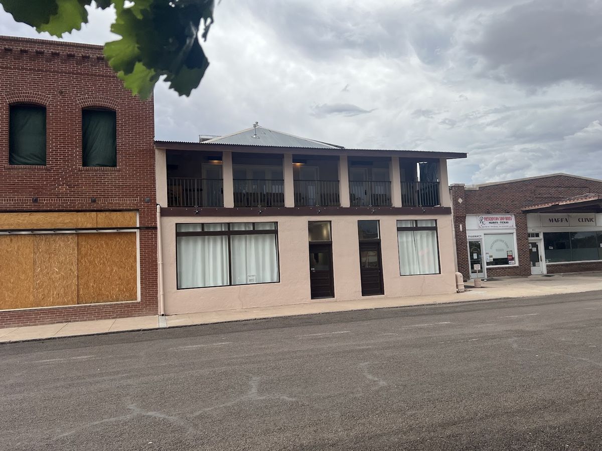 Holiday Capri Inn Marfa — refurbished mid-century roadside motel on West San Antonio Street with desert views