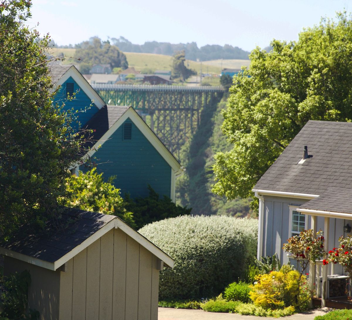 Mendocino headlands at golden hour — Pacific cliffs and Victorian village above the rugged Northern California coast