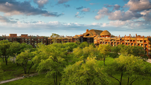 Orlando Florida — palm trees and resort architecture under blue sky, the family capital of America