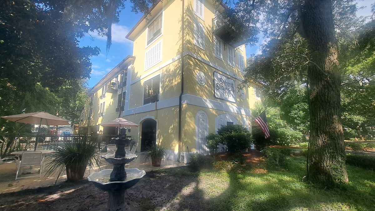 Village Inn & Pub — 1930s beach cottage hotel in Pier Village with mahogany English bar, Saint Simons Island