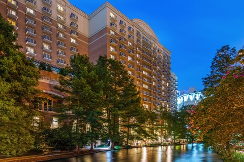 Hyatt Regency San Antonio Riverwalk — atrium hotel connecting River Walk to the Alamo