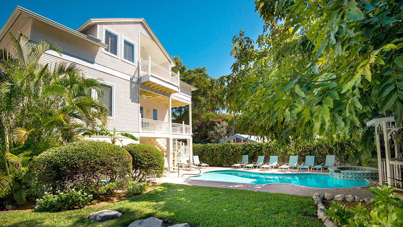 West Wind Inn Sanibel — beachfront boutique inn on Middle Gulf Drive with palm-shaded pool