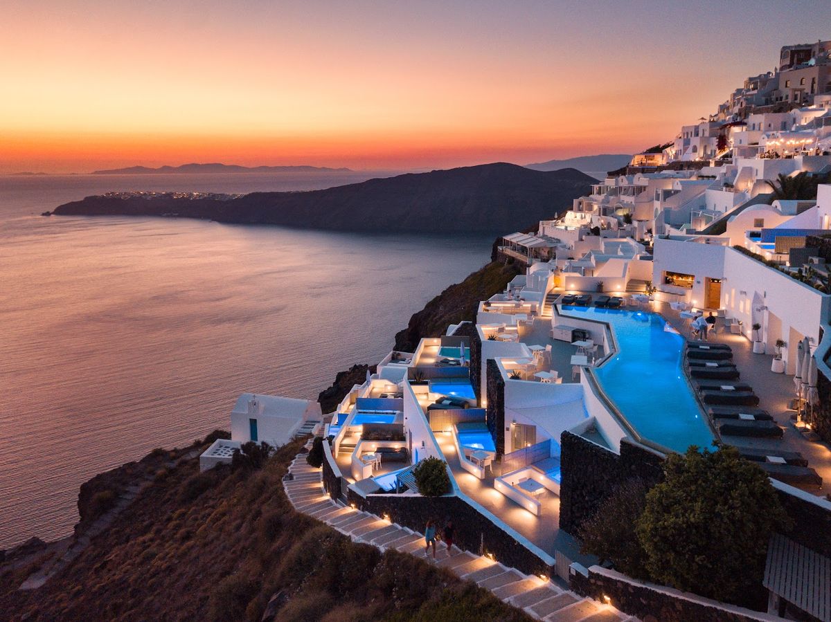 Canaves Oia Suites — whitewashed Cycladic suite with private infinity pool and Aegean Sea views in Oia