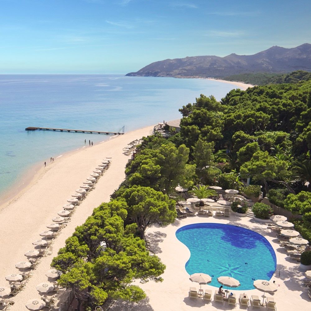 Su Gologone Experience Hotel Oliena Sardinia — interior Sardinian boutique hotel with traditional Sardinian art and cuisine