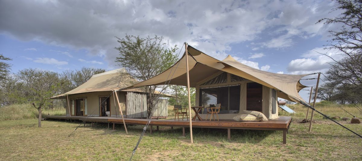 &Beyond Ngorongoro Crater Lodge — luxury safari lodge with 30 suites on rim of Ngorongoro Crater UNESCO heritage site