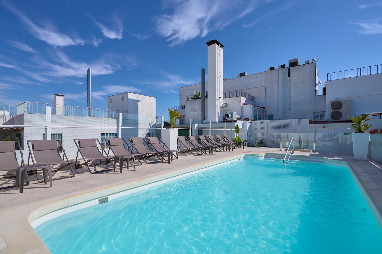 Hotel Becquer Seville — 134-room family-run mid-luxury flagship on Calle Reyes Católicos in central Seville