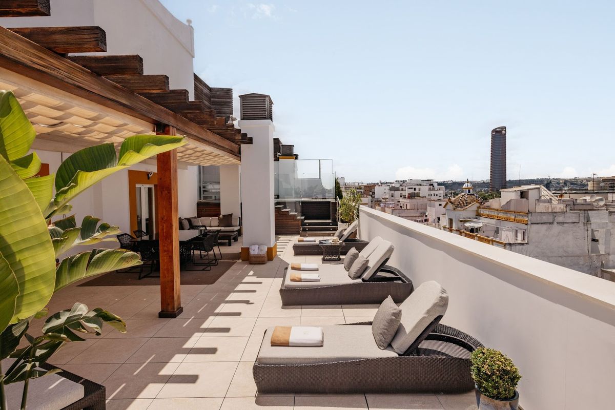 Casa 1800 Sevilla — boutique luxury hotel in 19th century mansion in Santa Cruz with rooftop terrace and Cathedral views