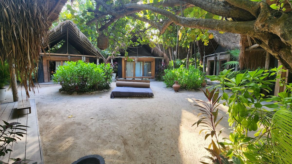 Azulik Tulum — adults only no-electricity beachfront luxury hotel with 48 stilt villas, hand-built Maya cosmology architecture