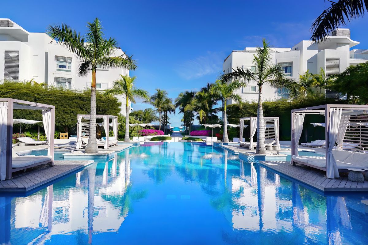 Gansevoort Turks Caicos — boutique 91 room beachfront resort on Grace Bay with rooftop infinity pool and Stelle restaurant