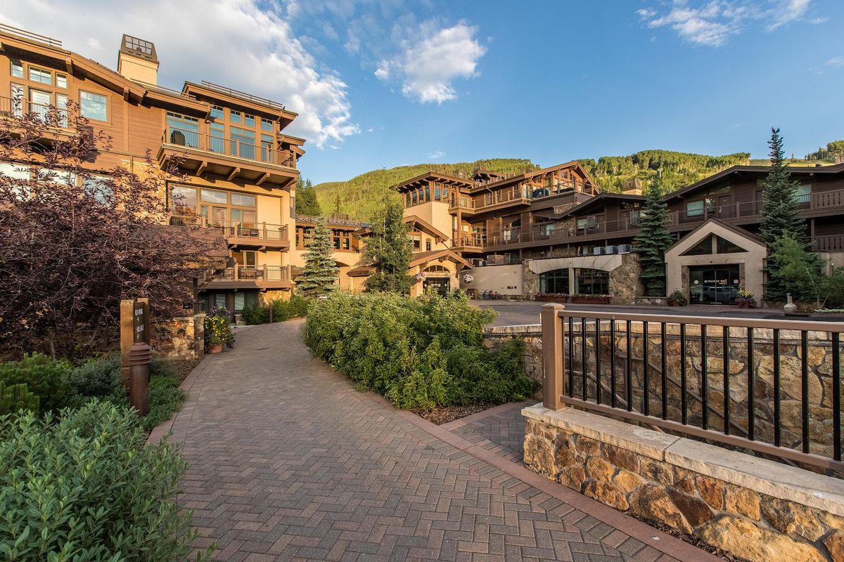 Tivoli Lodge — family-owned boutique hotel beside Gore Creek in Vail Village