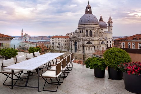 Hotel Danieli Venice — gothic Palazzo Dandolo lobby with grand staircase and red velvet, Riva degli Schiavoni