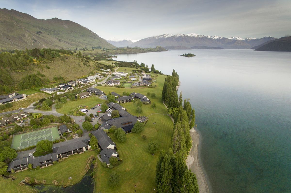 Wanaka New Zealand — Lake Wanaka with Southern Alps and Mt Aspiring National Park alpine luxury
